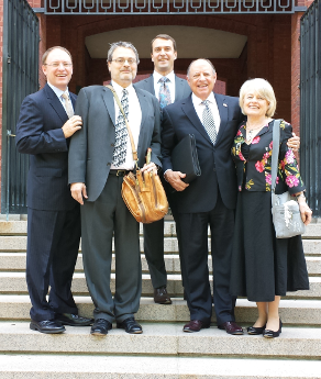 Mr. Hoffman (with litigation bag) with Danny and Del Ross, Mrs. Ross, and co-counsel Ian Crosby (rear) on the steps of the Federal Circuit Court of Appeals in D.C. after oral argument in May 2014